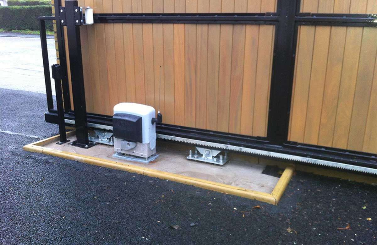 Automatic sliding gate motor installed for residential driveway security in Houston—reliable automatic gate repair for smooth operation