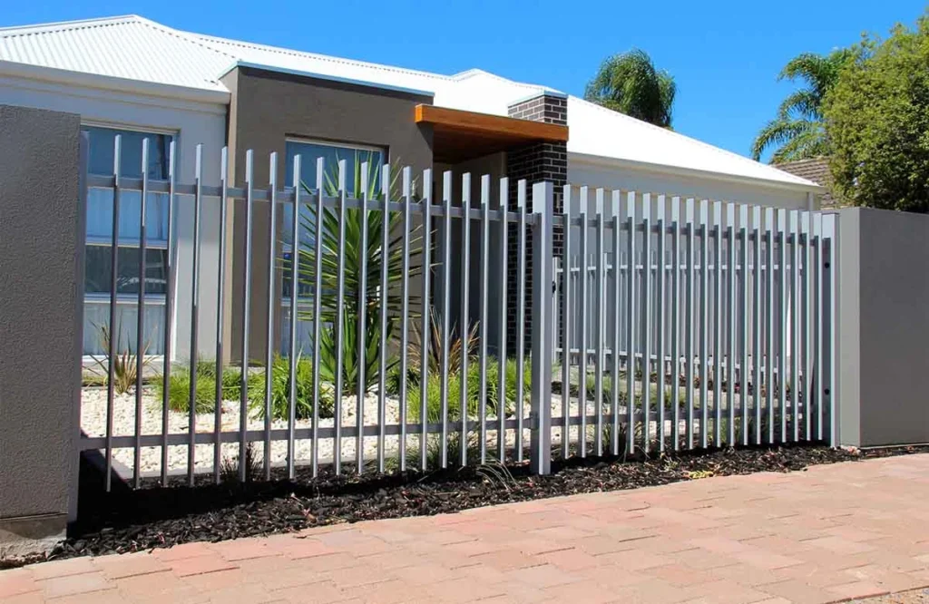Precision repair of sleek vertical steel fencing for commercial gate repair in Houston properties across Houston.